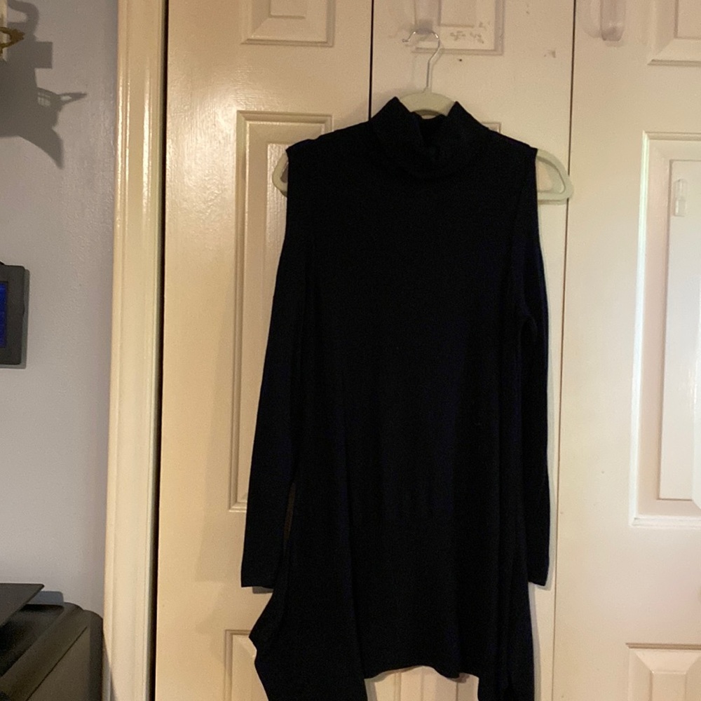 What a sweater??  Long shark bit hemline. Size medium $25.00